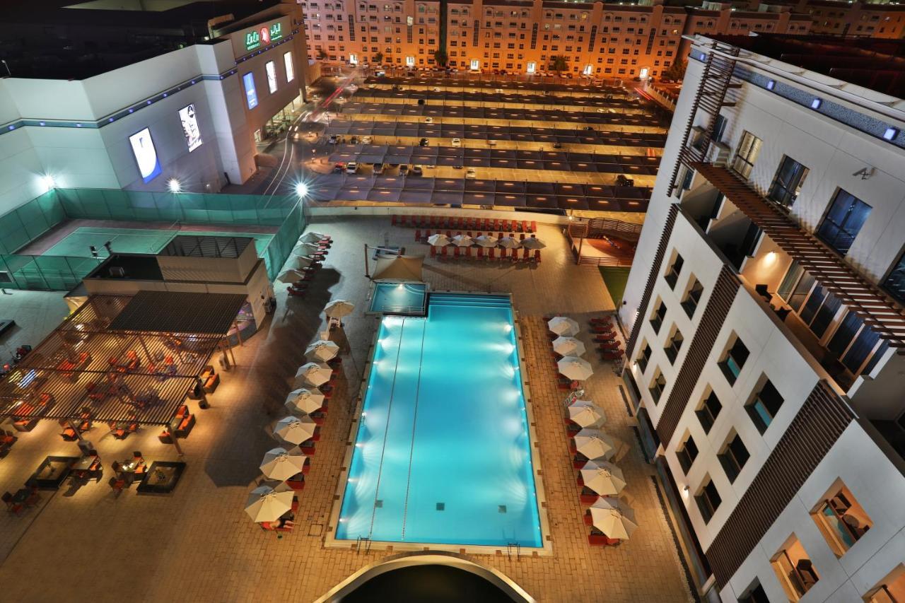 فندق هيلي ريحان باي روتانا العين المظهر الخارجي الصورة The hotel's pool