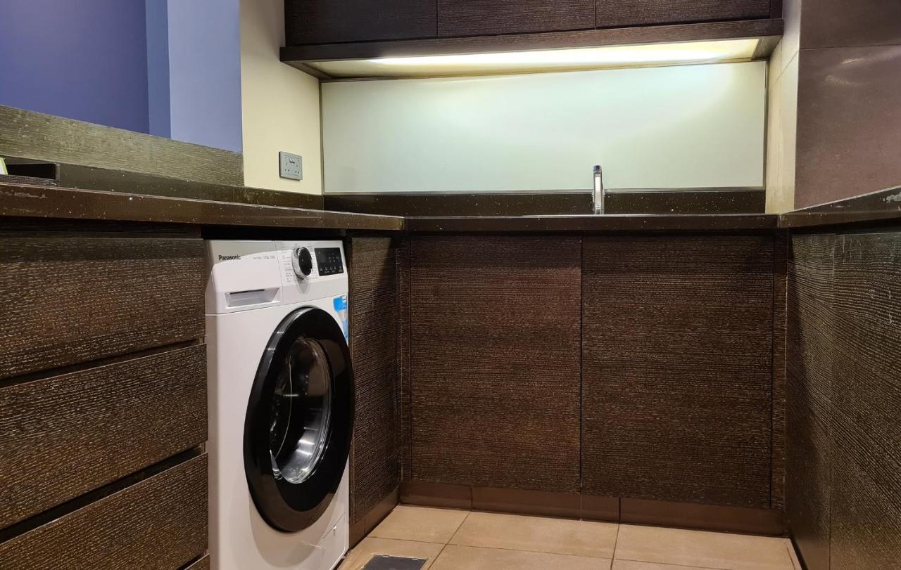 فندق هيلي ريحان باي روتانا العين المظهر الخارجي الصورة A laundry room