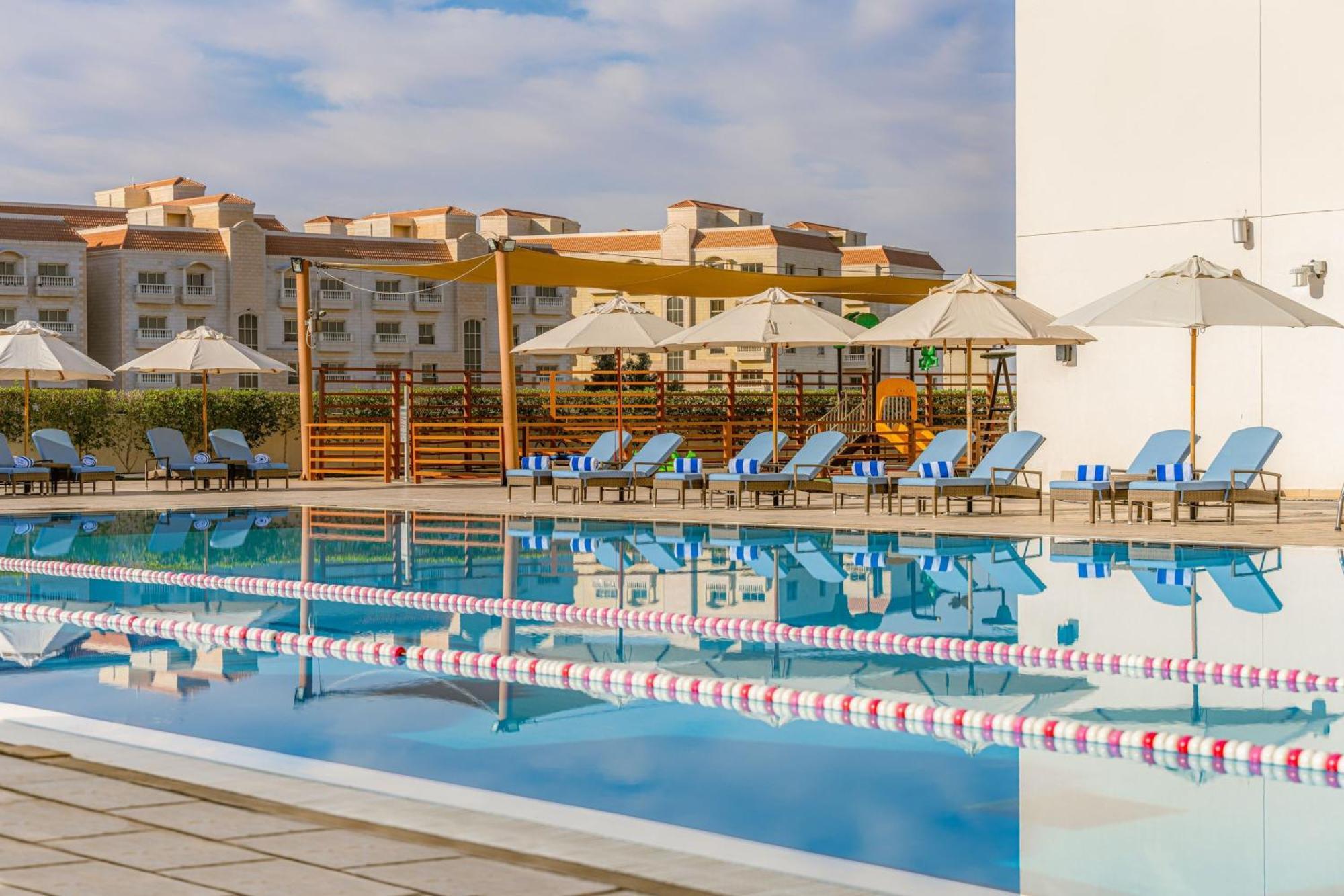 فندق هيلي ريحان باي روتانا العين المظهر الخارجي الصورة The pool at the Athens Olympic Aquatic Centre