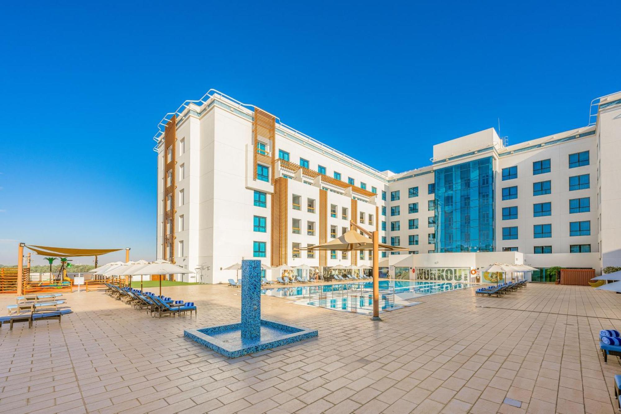 فندق هيلي ريحان باي روتانا العين المظهر الخارجي الصورة The hotel's swimming pool